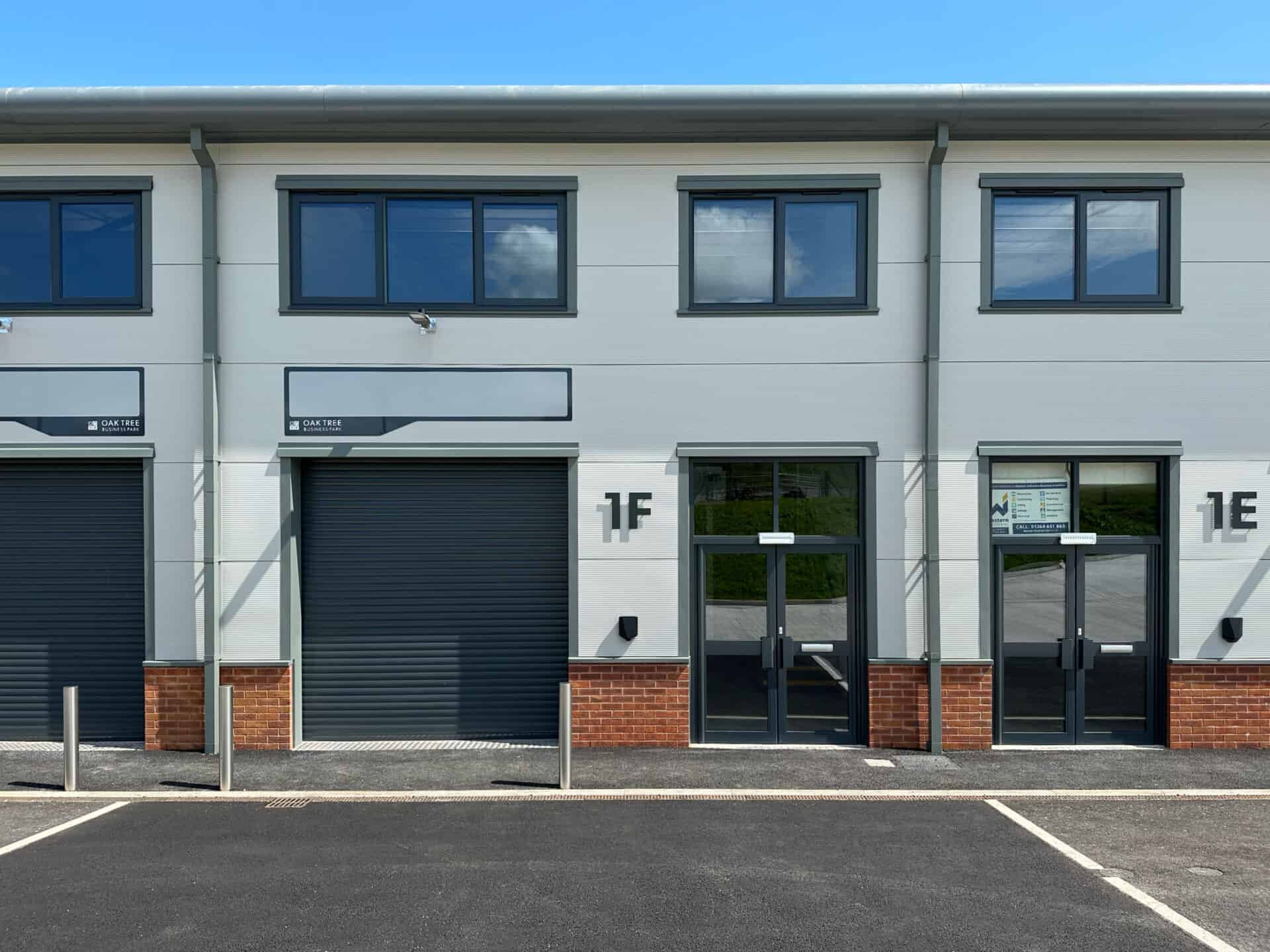 Front view of unit 1F at Oak Tree, Kingskerswell, providing a clear perspective of one light industrial unit available at the commercial development.