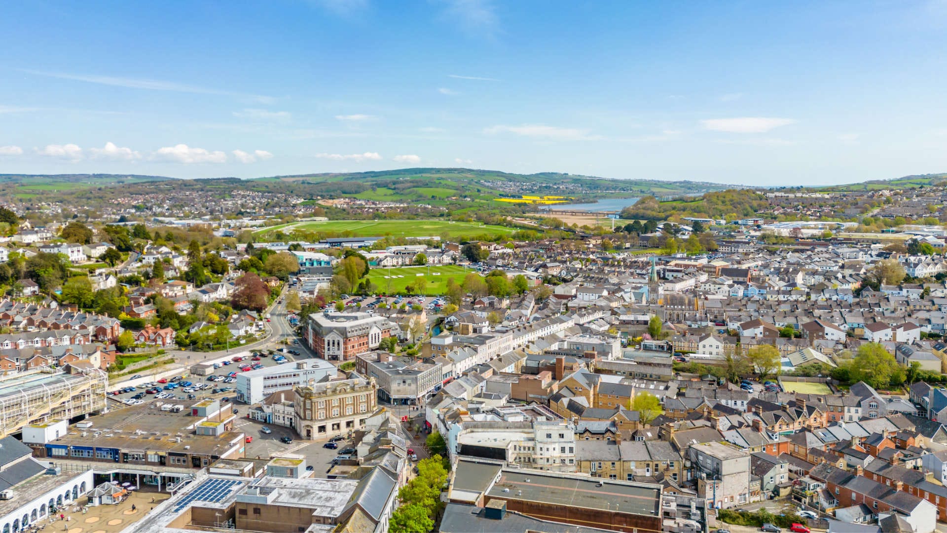 An aerial photograph taken from the perspective of a drone or helicopter of the town Newton Abbot in the South West of England.