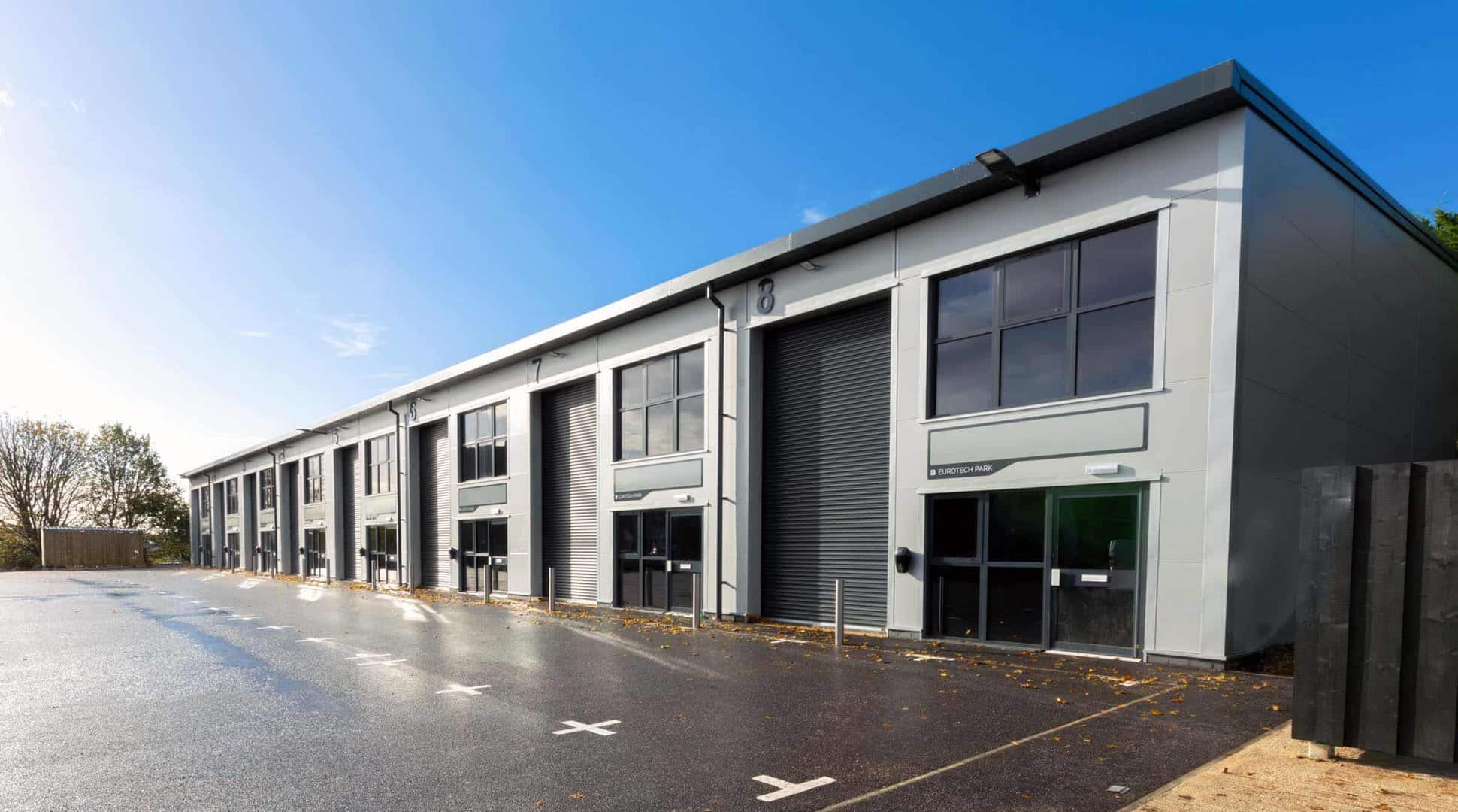 Exterior view of a row of units at Eurotech Park, Plymouth, showcasing the commercial spaces in this location.