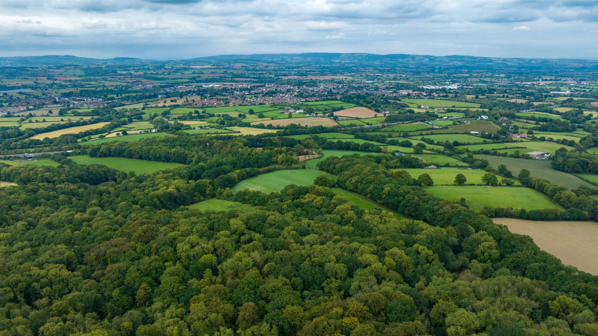 An aerial photograph taken from the perspective of a drone or helicopter of the town Wellington in the South West of England.